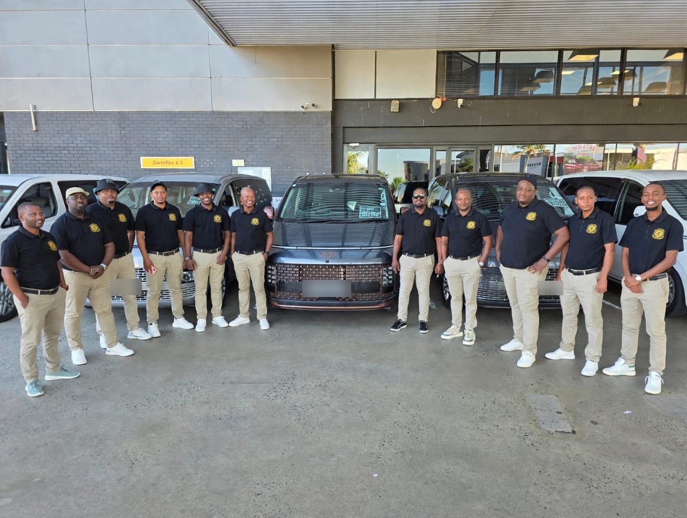 NTC chauffeurs in uniform with the Hyundai Staria fleet
